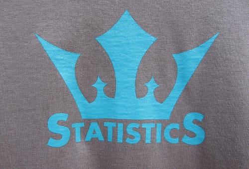 tshirt from Nausicaa Distribution featuring a crown and statistics